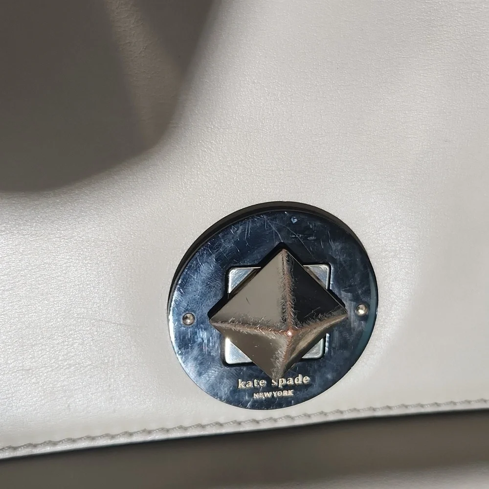 Kate Spade Purse good condion has some scuffs -latch and indent strap non ks